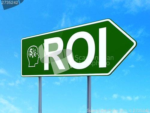 Image of Finance concept: ROI and Head With Finance Symbol on sign