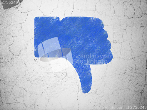 Image of Social network concept: Thumb Down on wall background