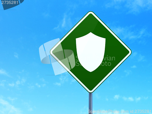 Image of Privacy concept: Shield on road sign background