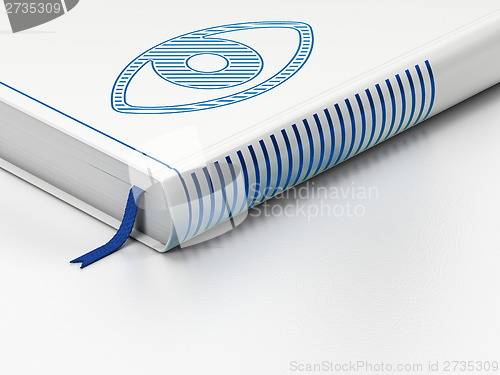 Image of Safety concept: closed book, Eye on white background