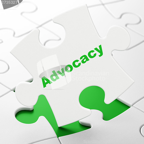 Image of Law concept: Advocacy on puzzle background