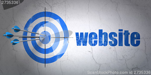 Image of Web development concept: target and Website on wall background