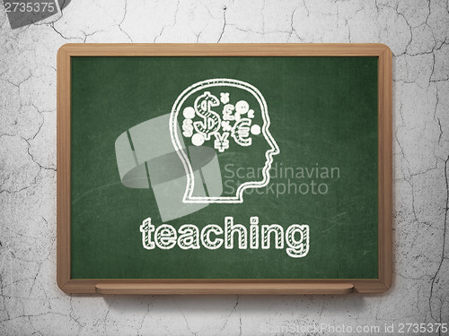 Image of Education concept: Head With Finance Symbol and Teaching