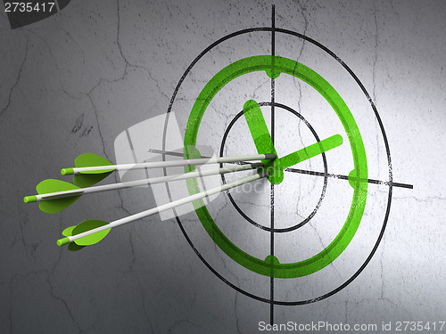 Image of Time concept: arrows in Clock target on wall background