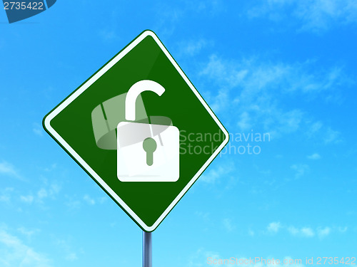 Image of Safety concept: Opened Padlock on road sign background