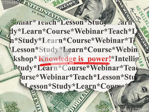 Image of Education concept: Knowledge Is power! on Money background