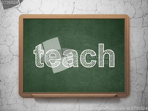 Image of Education concept: Teach on chalkboard background