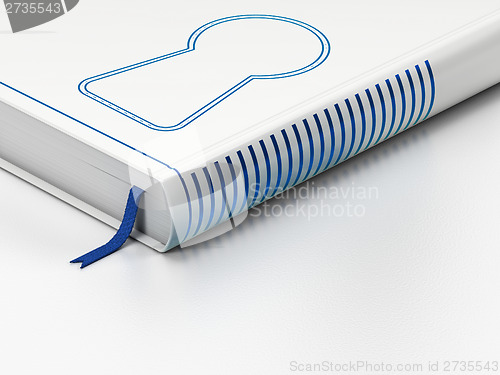 Image of Safety concept: closed book, Keyhole on white background