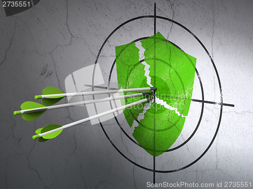 Image of Safety concept: arrows in Broken Shield target wall background