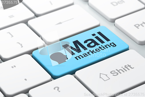 Image of Advertising concept: Head and Mail Marketing on keyboard