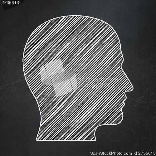 Image of Business concept: Head on chalkboard background