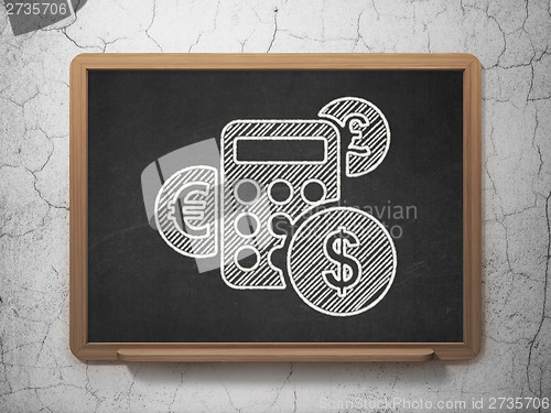Image of News concept: Calculator on chalkboard background