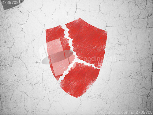 Image of Safety concept: Broken Shield on wall background