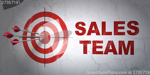 Image of Advertising concept: target and Sales Team on wall background