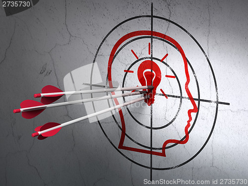 Image of Business concept: arrows in Head With Lightbulb target on wall