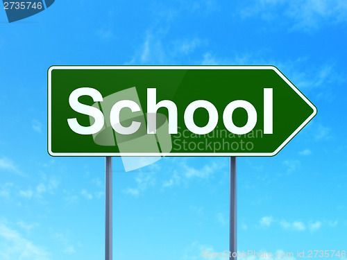 Image of Education concept: School on road sign background