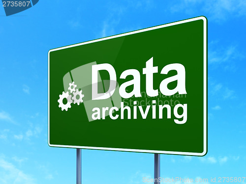 Image of Data concept: Data Archiving and Gears on road sign background