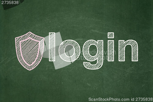 Image of Privacy concept: Shield and Login on chalkboard background