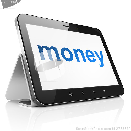 Image of Finance concept: Money on tablet pc computer