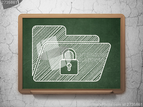 Image of Finance concept: Folder With Lock on chalkboard background