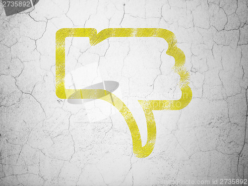 Image of Social network concept: Thumb Down on wall background