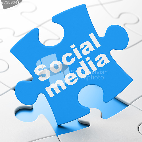 Image of Social network concept: Social Media on puzzle background
