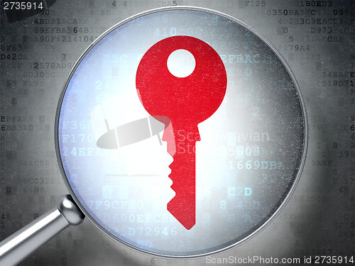 Image of Privacy concept:  Key with optical glass on digital background