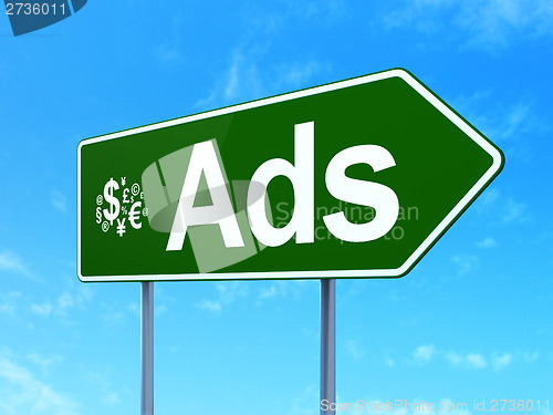 Image of Advertising concept: Ads and Finance Symbol on road sign