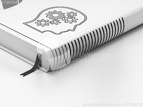 Image of Education concept: closed book, Head With Gears on white