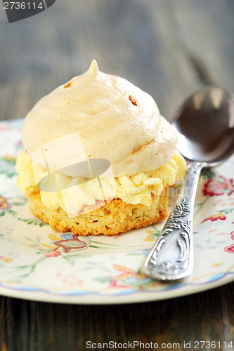 Image of Plate with meringue and teaspoon.