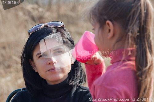 Image of Mother and daughter  resting