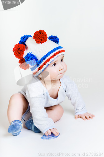 Image of cute baby in a knitted hat