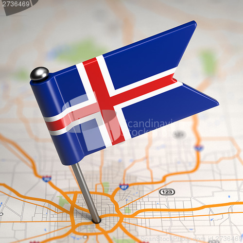 Image of Iceland Small Flag on a Map Background.