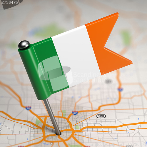 Image of Ireland Small Flag on a Map Background.