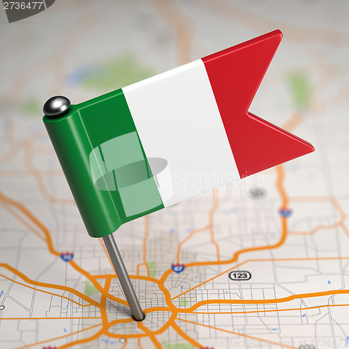 Image of Italy Small Flag on a Map Background.