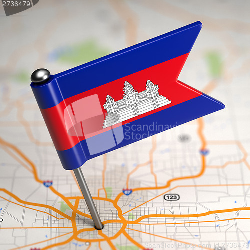 Image of Cambodia Small Flag on a Map Background.