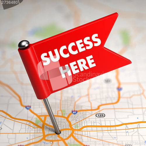 Image of Success Here - Small Flag on a Map Background.