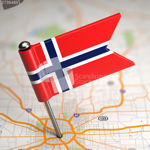 Image of Norway Small Flag on a Map Background.