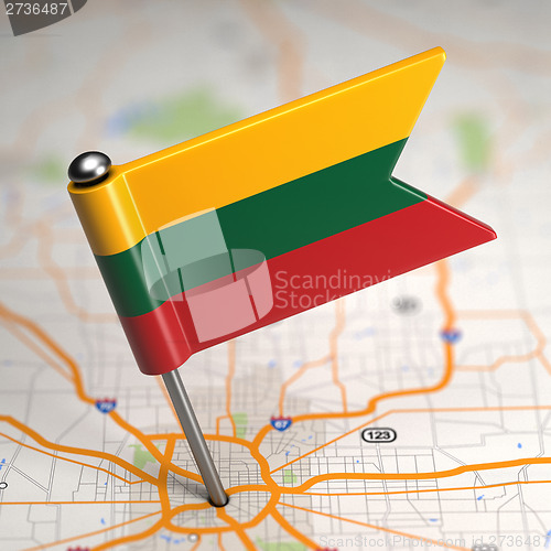 Image of Lithuania Small Flag on a Map Background.