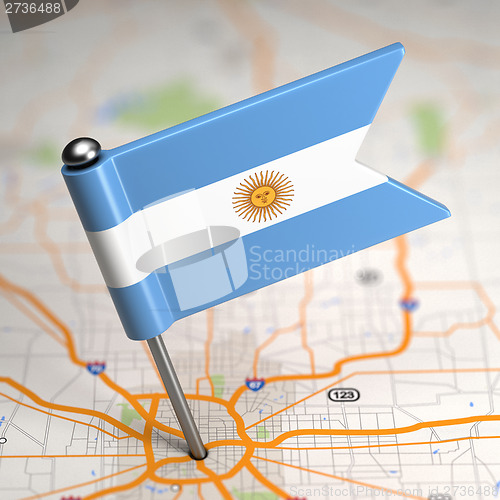 Image of Argentina Small Flag on a Map Background.