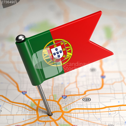 Image of Portugal Small Flag on a Map Background.