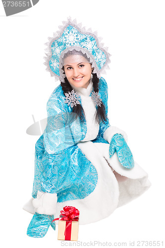 Image of Young joyful woman posing in winter costume