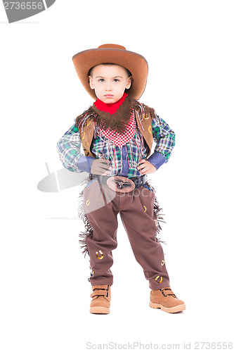 Image of Little boy wearing cowboy suit
