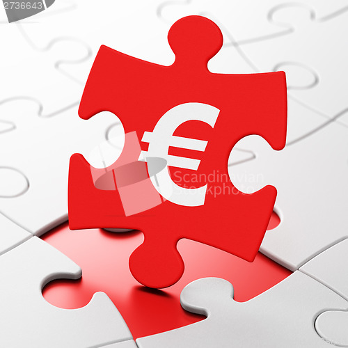 Image of Currency concept: Euro on puzzle background
