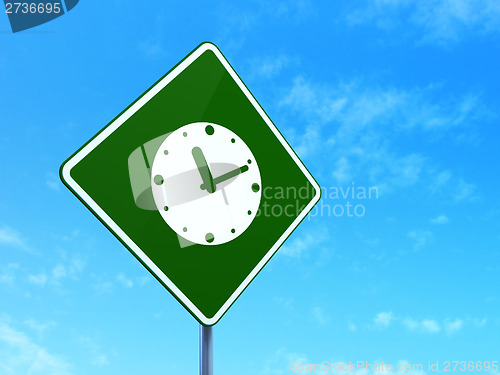 Image of Timeline concept: Clock on road sign background