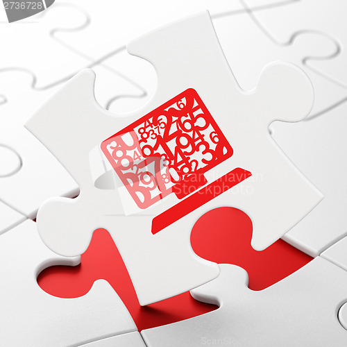 Image of Education concept: Computer Pc on puzzle background