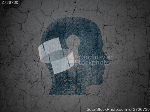 Image of Education concept: Head With Keyhole on grunge wall background