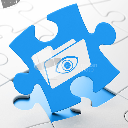 Image of Finance concept: Folder With Eye on puzzle background