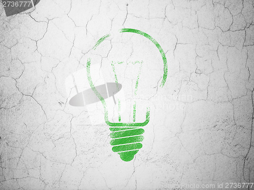 Image of Finance concept: Light Bulb on wall background