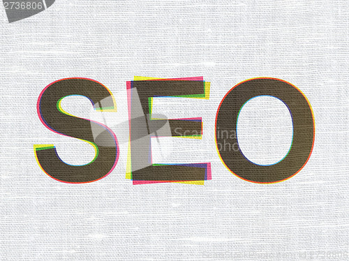 Image of Web design concept: SEO on fabric texture background